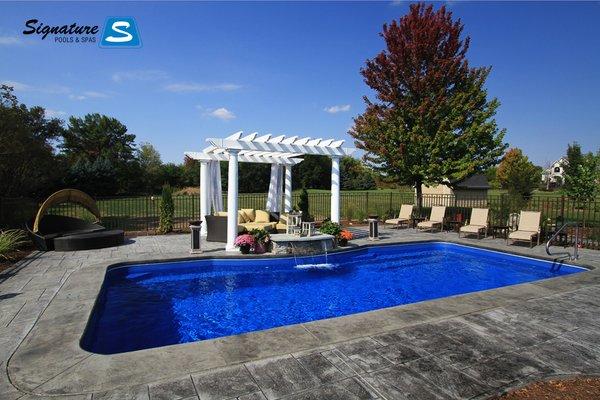 Signature Pool in St. Charles, IL. This Signature Fiberglass Pool is  30' 10" x 14' 6" and is called the Moroccan 31.