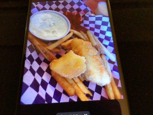 Half eaten halibut & chips