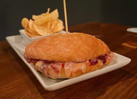 The Brie & Apple Grilled Cheese is absolutely delicious. Grandma's recipe, with a homemade cranberry dijon honey spread. 
It's the best!