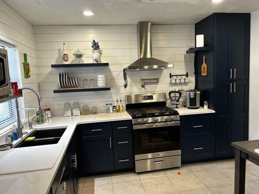 We love our quartz countertops. The storage is perfect!