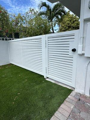 Aluminum fence with walk in gate