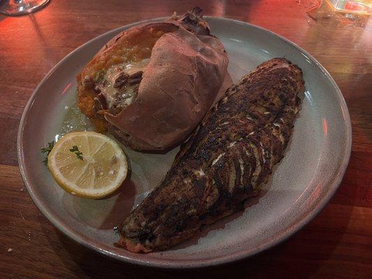 Blackened red snapper with a sweet potato loaded with cinnamon butter and pecans