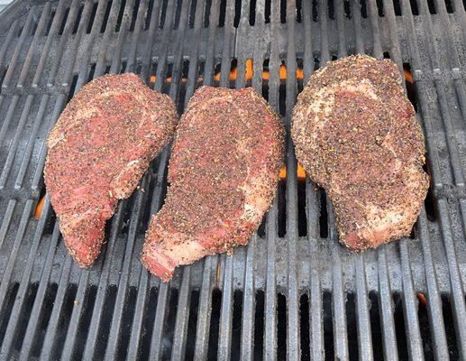 Rib eyes on the grill (seasoned by us)