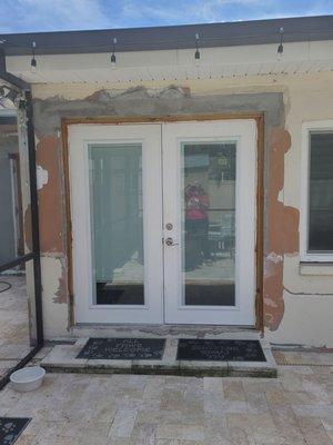 Exterior of French doors. Unfinished after 6 months