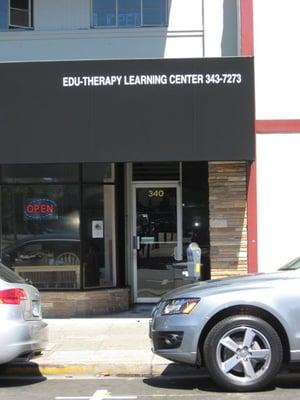 Edu-Therapy Learning Center (street view) upstairs from All Fired Up Ceramics Shop, across the street from IL FORNAIO Restaurant.