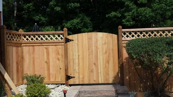 Wood Privacy Fence With a Lattice Top