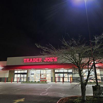 The long shot of the new Trader Joe's. The maple tree interferes with the Disabled Parking stall. Corrective pruning is required.