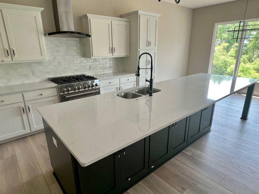 Flooring, Countertops and backsplash tile by McKean's