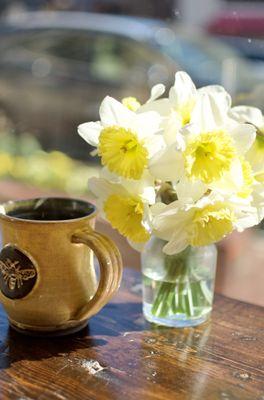 Fresh coffee and flowers