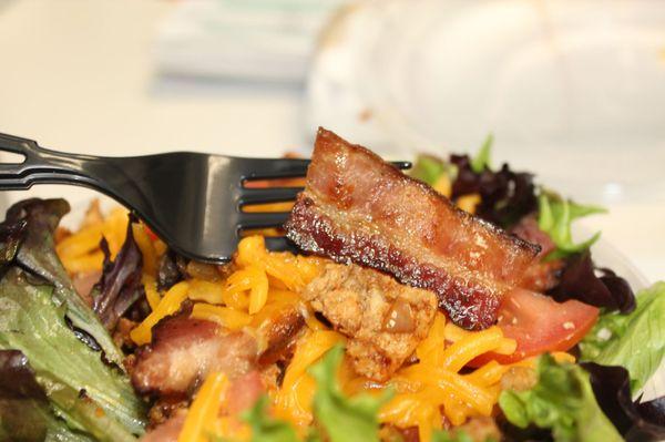 Bacon chicken salad.  Giant delicious bacon pieces. Next to Aces Nails & Spa.