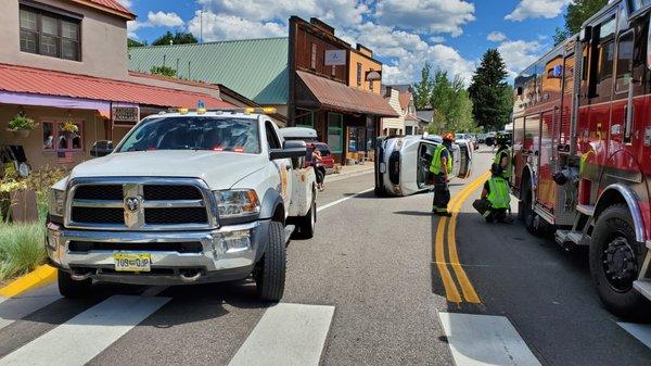 West Vail Shell tow truck getting ready to flip and tow car