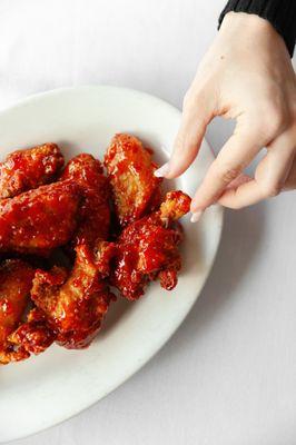 Ritz Chicken Wings: choice of hot, medium, mild or thai chili sauce