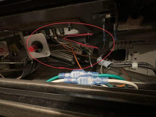 Photo showing fan dislodged from mounting.