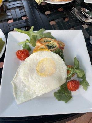 Spinach and feta tart topped with fried egg