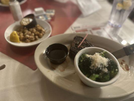 Filet, bay scallops and broccoli.