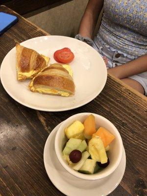 Egg Breakfast Croissant Sandwich and fruit cup