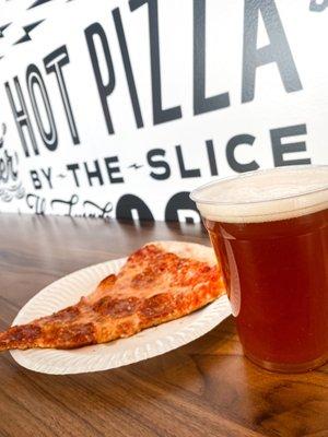 Beers on tap with fresh hot slices