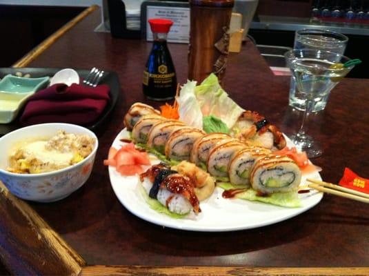 Jenpachi roll, eel sushi, saki vodka martini and rice with lobster sauce.