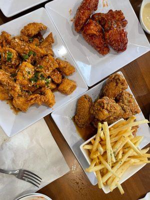 Boneless galbi wings(left) . Fries YUM and soy garlic wings(bottom right) . Sweet and spicy wings (top right)