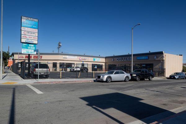 A corner view of our center, with Papa John's, Extreme Klean Cleaners and LDM Salon.