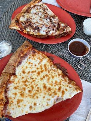 Cheese pizza and sausage and bacon pizza slice