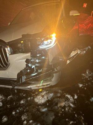 My X7 wiping out on frozen road damaging the front of the vehicle in a snow bank