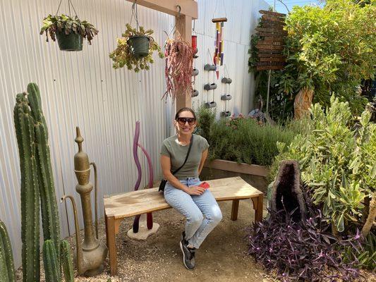 Kristina on the bench at The Prickly Pear