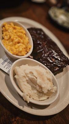 Ribs with garlic mashed potatoes and macaroni and cheese