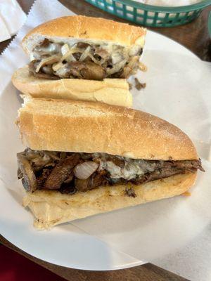 Philly Beef Cheesesteak Sub with onions and mushrooms.