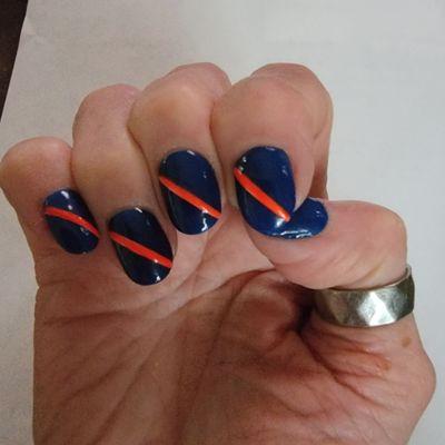 Kim did an awesome job on my nails. I wanted Appleton East High School Colors in honor of my Grandson's Graduation.  GO PATRIOTS !