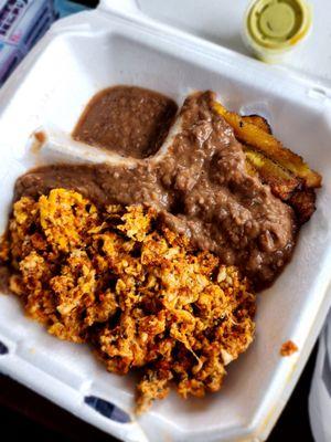 Chorizo egg scramble with refried bean and plantain.