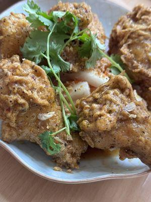 An An wings - Chicken in caramelized fish sauce with crispy garlic, cilantro, and lime.