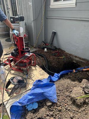 Epoxy sewer pipe repair under slab foundation