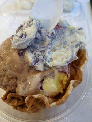 A triple scoop waffle bowl