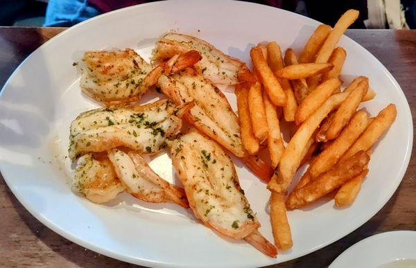 Grilled shrimp, spicy French fries.