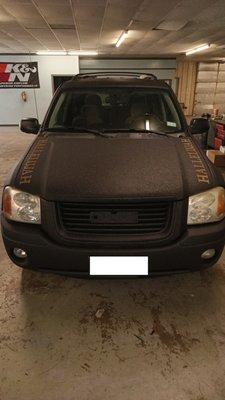 Armor Coat with letter stenciling on a 2006 GMC Envoy