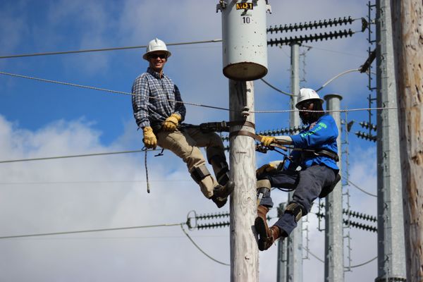 Eversource Lineworkers practice their climbing skills.