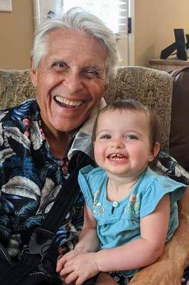 Laughing with my first granddaughter, Ava.