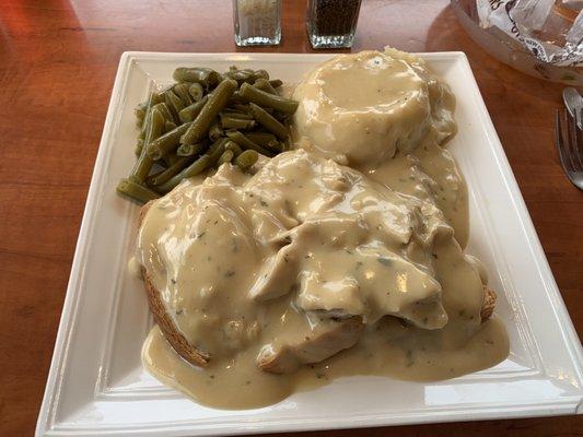 Hot Turkey sandwich and mashed potatoes with green beans. Was not too bad