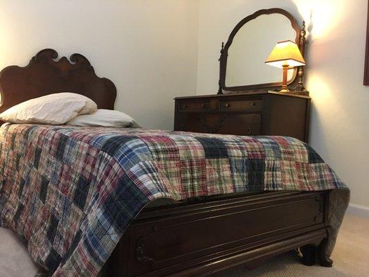 Antique twin headboard and footboard.  I'm not sure if walnut or mahogany .. 1930/40... the frame is a twin XL for adults bought on Amazon.