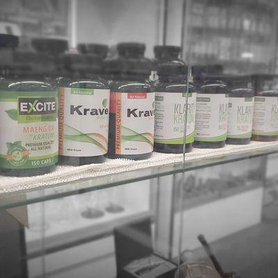 Collection different sizes and brands of kratom.