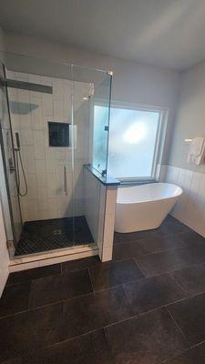 Walk in showerw/ Frameless glass enclosure