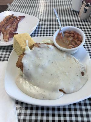 Chicken fried chicken special with mashed pos, beans and cornbread.