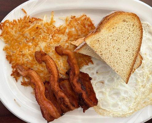 Egg whites, bacon, sourdough bread, and hash browns