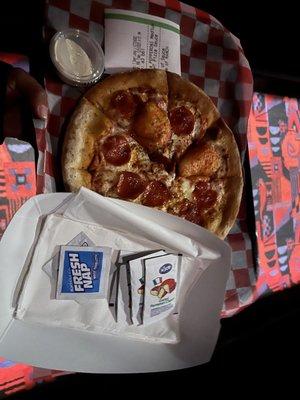 Pepperoni pizza and side of ranch.