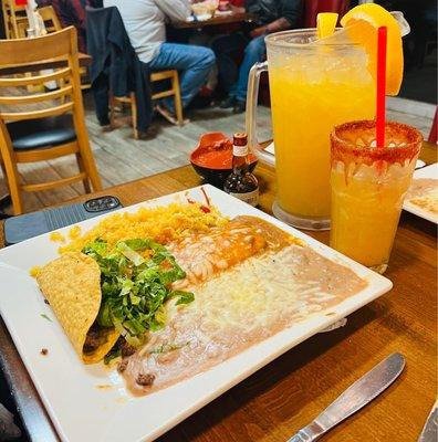 Beef taco, cheese enchilada, beans, rice, and a pitcher of the top shelf Cadillac margarita.