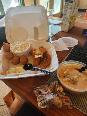 Rock basket with Mac n cheese, side small hushpuppies, crab bisque.