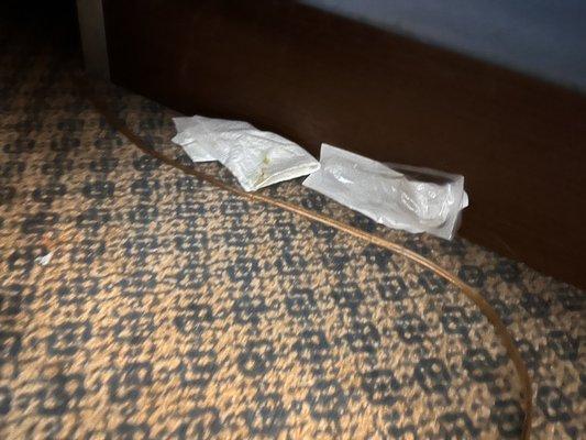 Dirty, snotty tissues left beside the bed