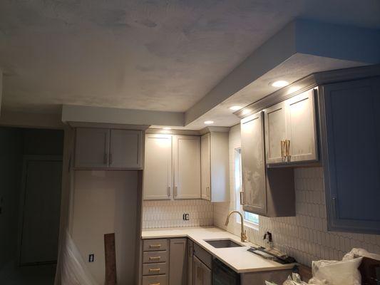 Kitchen cabinet and crown molding install. All new fixtures and plumbing