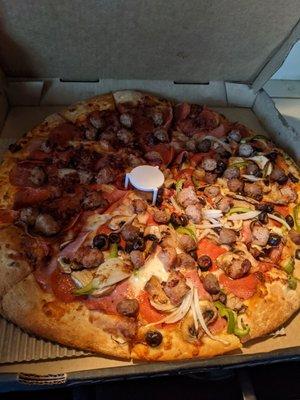 Extra large half pizza guys combo half meat lovers